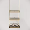 Golden Three Tiered Shelf with Metal Railings and Transparent Patterned Bottles on Bottom Two Tiers
