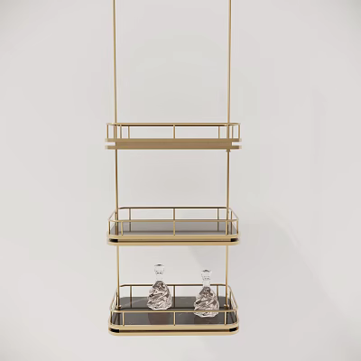 Golden Three Tiered Shelf with Metal Railings and Transparent Patterned Bottles on Bottom Two Tiers 3d model