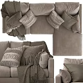 Comfortable Sectional Sofa Featuring Neutral Upholstery Patterned Pillows And Soft Throw Blanket 3d model