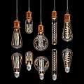 Vintage Industrial Pendant Lights With Copper Bases And Filament Bulb Designs