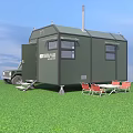 Green Mobile Camping Trailer With SUV Table Red Chairs On Grassland