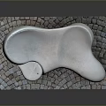 Natural Stone Bench With Irregular Shape On Colored Paving Stones Dark Background 3d model