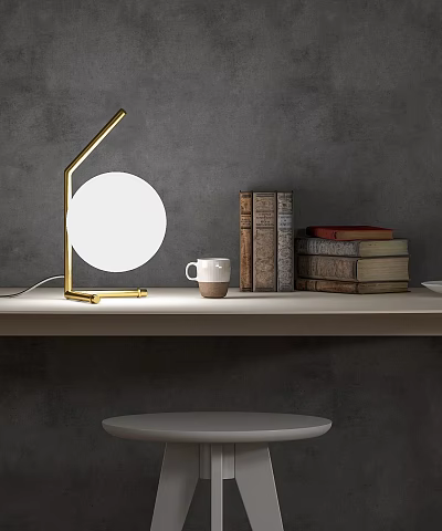 Desk with Golden Stand Round Lamp Coffee Cup and Stack of Books on White Tabletop Against Gray Wall 3d model