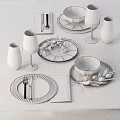 Dining Table Setup With Green Plates Olive Branches Glassware Cutlery And Napkins