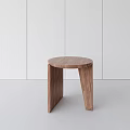 Modern Minimalist Wooden Stool With Round Seat And Unique Leg Structure