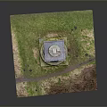 Ancient Brick Tower Historical Architecture With Stone Base And Green Vegetation