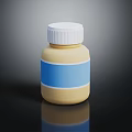 Yellow Pill Bottle With White Screw Cap Blue Label And Reflective Finish On Black Surface