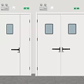 White Emergency Doors with Small Windows Black Handles and Green Exit Signs Above Light Walls