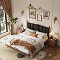 Double Bed with Black Leather Headboard White Floral Sheets and Wooden Nightstand