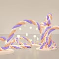 Decorative Art Installation With Orange Purple Braided Ropes White Stars Round Lights And White Base