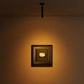 Recessed Spotlight Highlighting Framed Painting With Warm Yellow Light In Dim Wall Setting