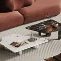 Black And White Marble Coffee Table With Small Plant Bowl Magazines By Brown Sofa