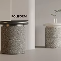 POLIFORM Textured Side Tables with Black And White Tops and Small Plant In Modern Interior
