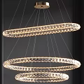 Elegant Double Circular Crystal Chandeliers With Sparkling Crystals Hanging In Modern Interior