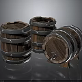 Three Wooden Barrels Featuring Metal Hoops And Tap Faucet Design