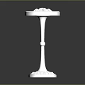 Elegant Metallic Side Table With Intricate Carved Top And Decorative Base