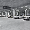 Underground Parking Lot With Multiple White Cars Parking Lines Pillars And Directional Signs