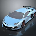 Light Blue Sports Car With Rear Spoiler Red Alloy Wheels And Sporty Design
