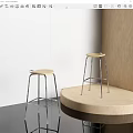 Modern Bar Stools With Wooden Seat And Metal Legs In Interior With Round Counter