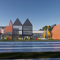 Modern School Building With Gabled Roofs Red Brick Exteriors And Outdoor Playground Area