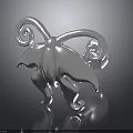 Silver Metal Butterfly Ornament With Spiral Antennae And Curved Wings On Reflective Black Surface