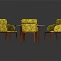 Round Speckled Table with Patterned Yellow Chairs and Red Legs Modern Dining Set
