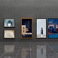 Multiple Advertising Billboards Displayed on Wall in Exhibition Space With Various Designs