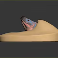 Gray And Pink Spotted Reptile Head With Blue Eyes Emerging From Yellow Sandy Surface