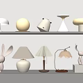 White Decorative Table Lamps With Various Creative Shapes Displayed On Shelves 3d model