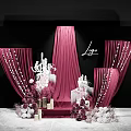 Elegant Wedding Decoration Setup With Red Curtains White Chandelier And Floral Arrangements Against Black Backdrop