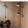 Modern Wall Lamps With Black Metal Structure And Gold Trim On Wooden Wall Surface