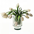 Transparent Glass Vase With Vertical Stripes Holding Fresh White Tulips And Green Leaves