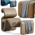 Modern Curved Lounge Chairs In White Brown Blue With Throw Blankets And Ottoman