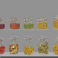 Transparent Glass Spice Jars With Colored Spices On White Shelf