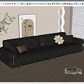 Black Leather Three-Seater Sofa with Brown and Yellow Cushions in Modern Interior