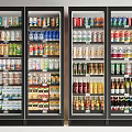 Black Upright Glass Door Freezers Neatly Stocked With Beverages And Food Items