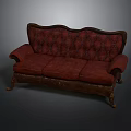 Classic Vintage Sofa Featuring Red Tufted Upholstery Carved Wooden Frame And Ornate Legs