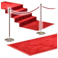Red Square Carpet on Staircase with Metal Stanchions and Ropes for Elegant Look