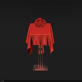 Red Tablecloths With Flower Arrangements On Metal Stands Against Black Background
