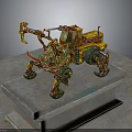Yellow Green Mechanical Vehicle With Intricate Structure And Large Wheels On Stone Platform