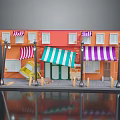 Miniature Model Street Scene With Orange Buildings Colorful Awnings Street Lamps Tables And Chairs