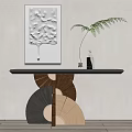 Stylish Console Table with Black Top Fan Shaped Wooden Base Fern Plant and Wall Artwork