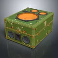 Vintage Green Square Electronic Device With Worn Out Appearance And Orange Circular Speakers