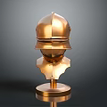 Golden Medieval Armor Helmet With Metallic Finish On Display Stand