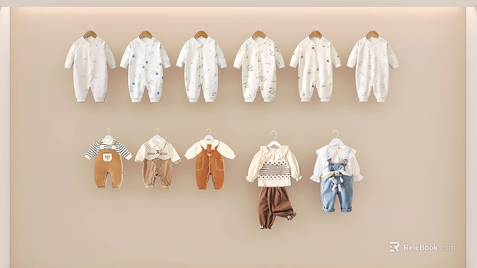 Baby Clothes With Various Styles Hanging On Hangers Including Onesies Overalls And Sweaters 3d model 