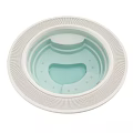 Stylish Round Bathtub Featuring White Textured Edge Light Blue Interior And Small Massage Holes