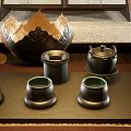 Elegant Console Table With Black Ceramic Teapot Cups Decorative Bowl And Containers On Textured Floor