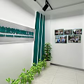 Bright Modern Learning Space With Wooden Tables Chairs And Wall Charts