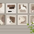 Eight Abstract Paintings on Wall with Geometric Shapes Lines Neutral Tones Black Frames Green Plant