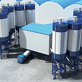 Industrial Factory with Multiple Blue and White Silos Blue Roof Building and Blue Truck